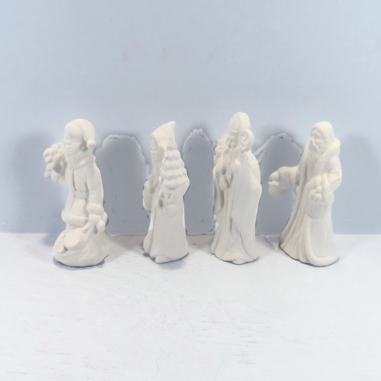 Handmade Set of 4 Ready to Paint Ceramic Santa Figurines for You to Paint for Christmas Decor