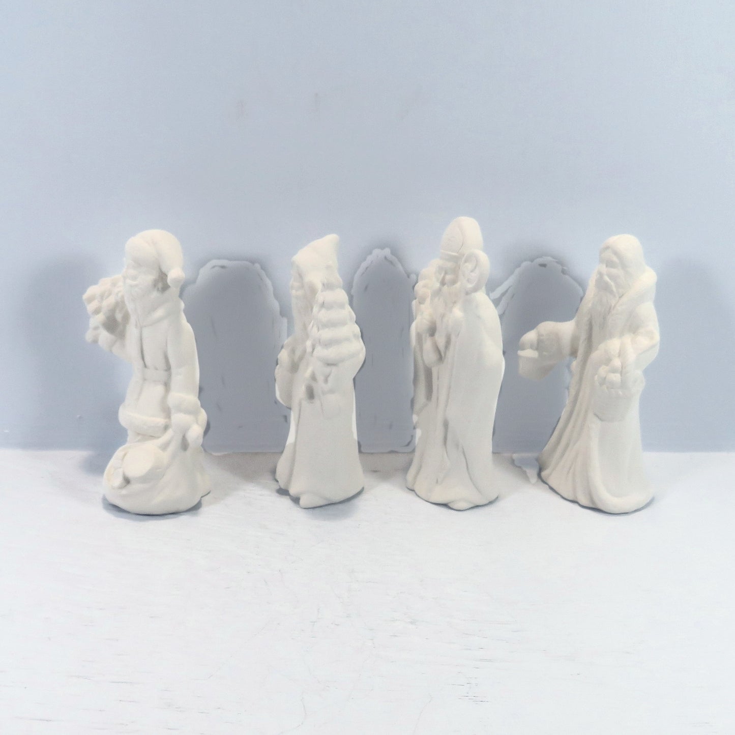 Handmade Set of 4 Ready to Paint Ceramic Santa Figurines for You to Paint for Christmas Decor