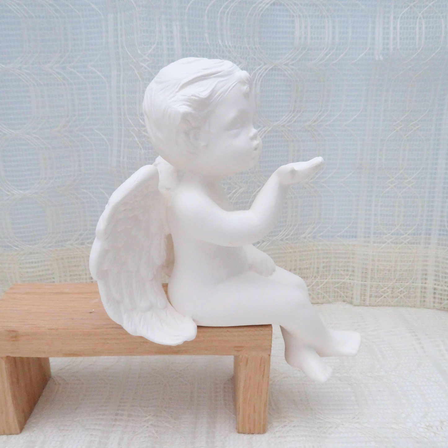 Ready to Paint Ceramic Cherub Figurine Blowing Kisses Sitting on a Bench, Paintable Ceramic Angel Statue, Ceramic Cherub For You To Paint