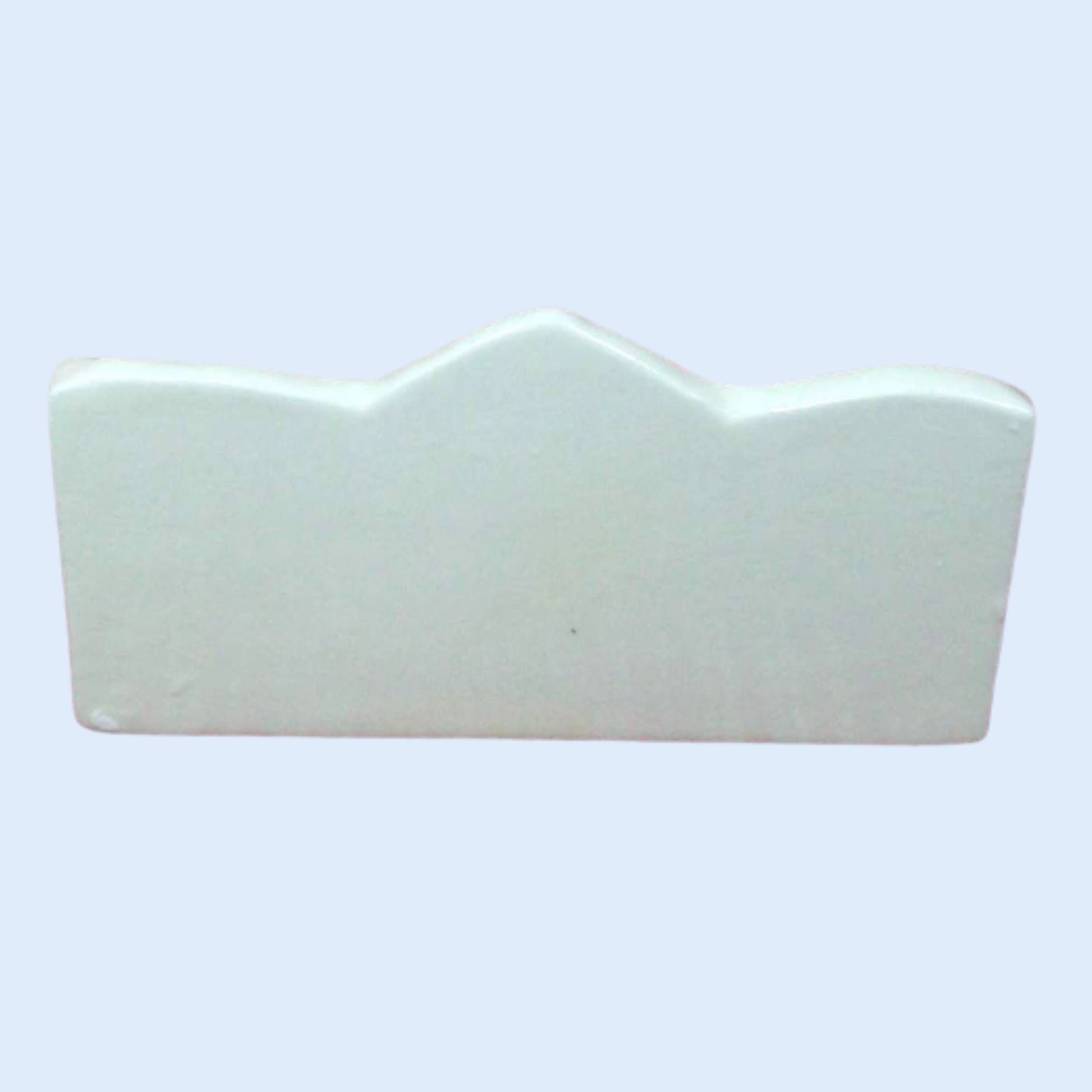 Back side of white glossy ceramic business card holder