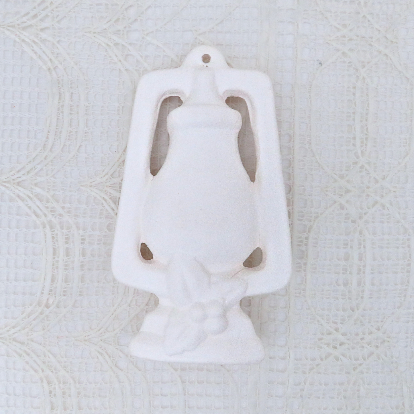 Unpainted ceramic Christmas tree ornament rear view