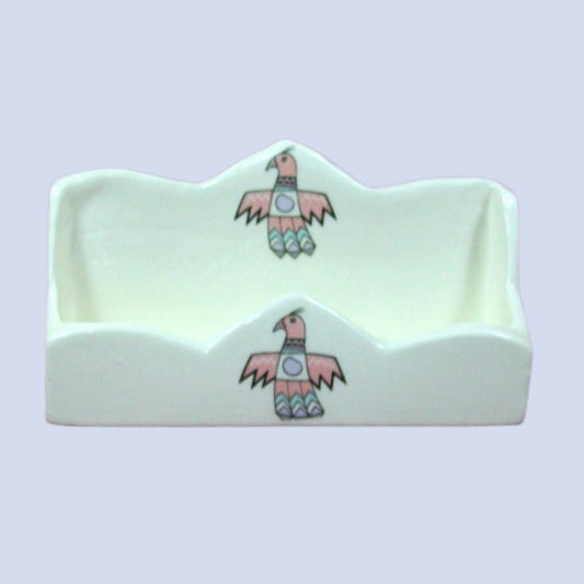 White ceramic business card holder with thunderbirds on the front center and the back front center section