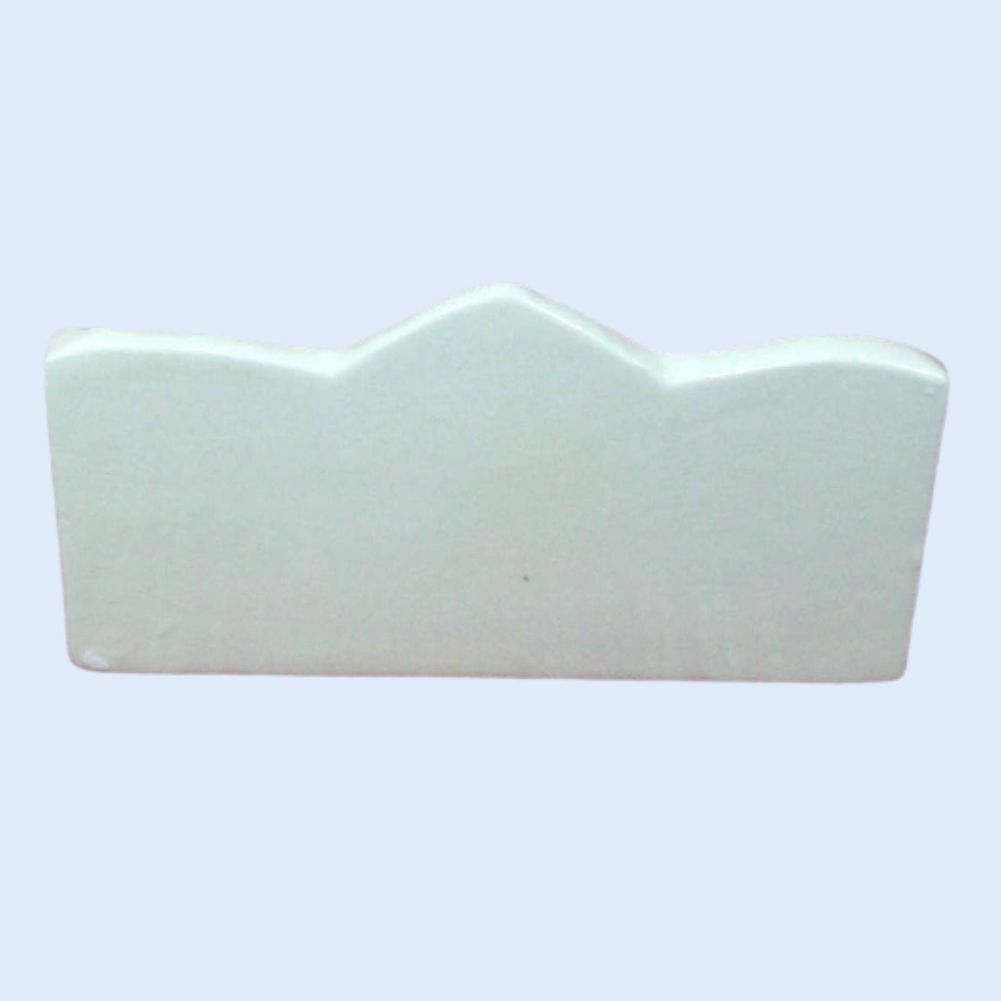 Back side of white glossy ceramic business card holder